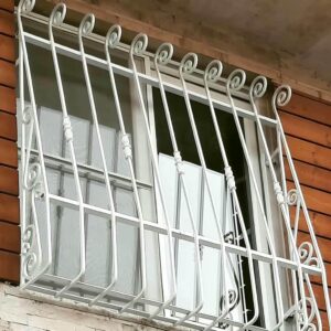 window - guard - iron - fence - wrought - iron - tl راهنمای کامل خرید و نصب حفاظ آهنی پنجره