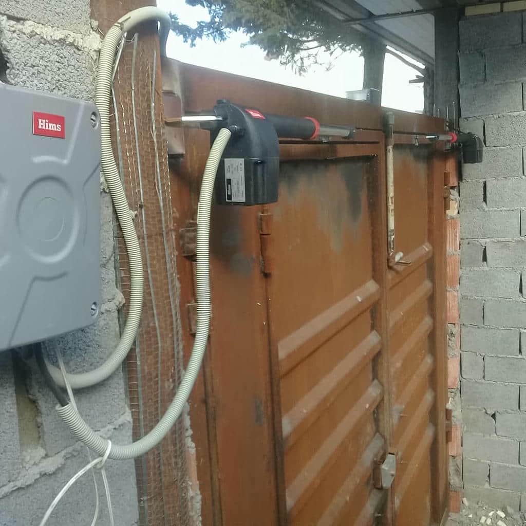 نصب جک درب پارکینگ تراز دقیق در خرم آباد