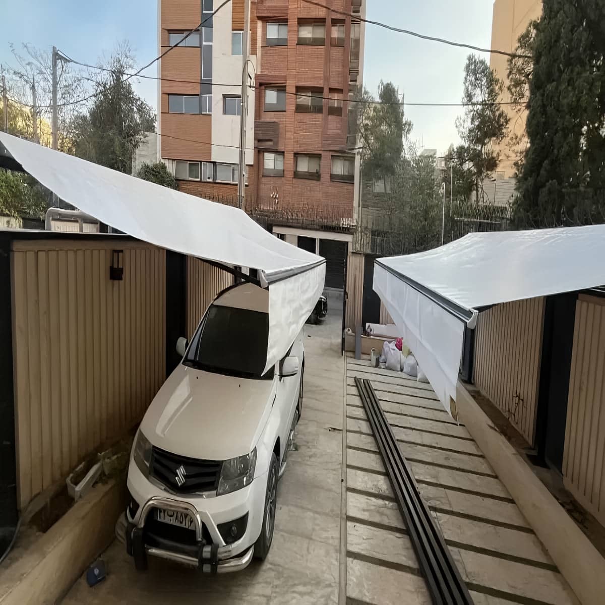 سایبان برقی با پارچه مقاوم در برابر باران سایبان برقی با پارچه مقاوم در برابر باران