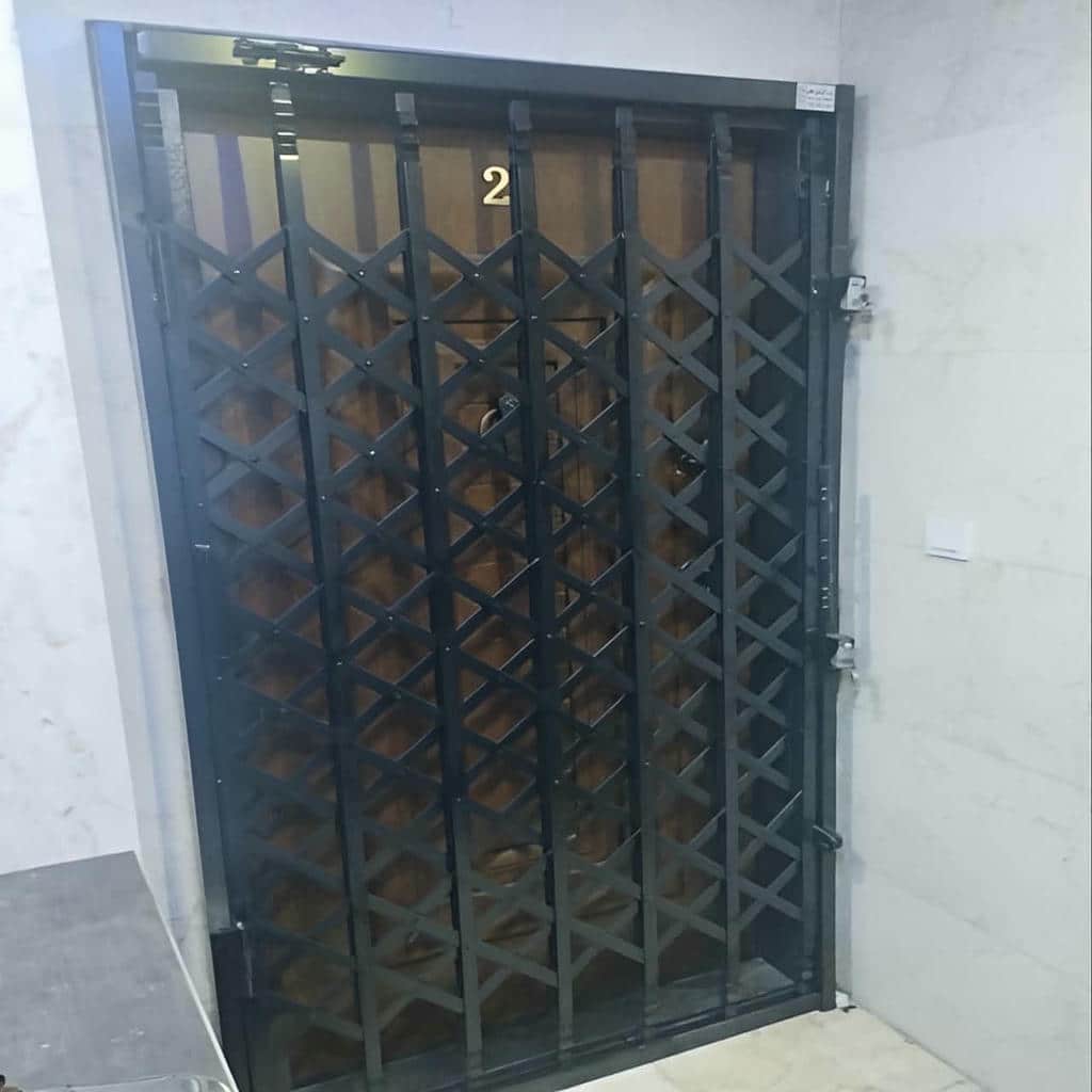 قیمت درب آکاردئونی سلطنتی گل دار با تسمه فولادی